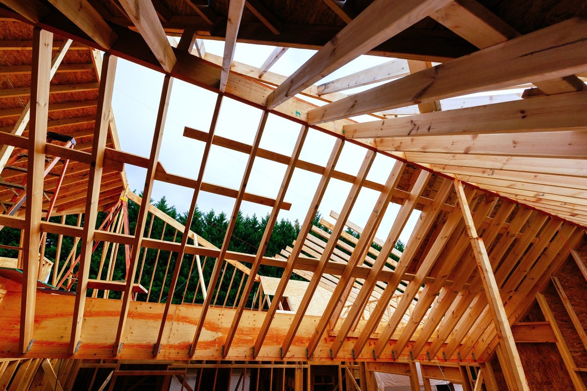 Crew framing a residential structure under construction